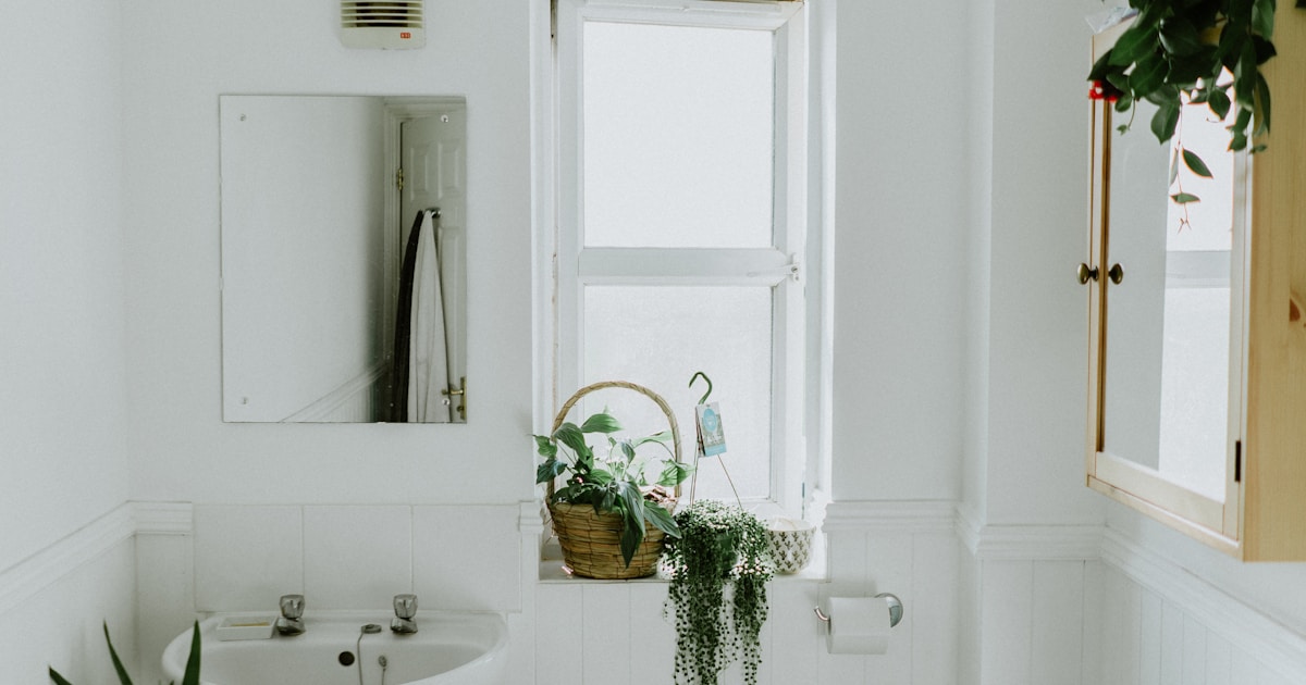 Freshly tiled bathroom floor with white subway tiles