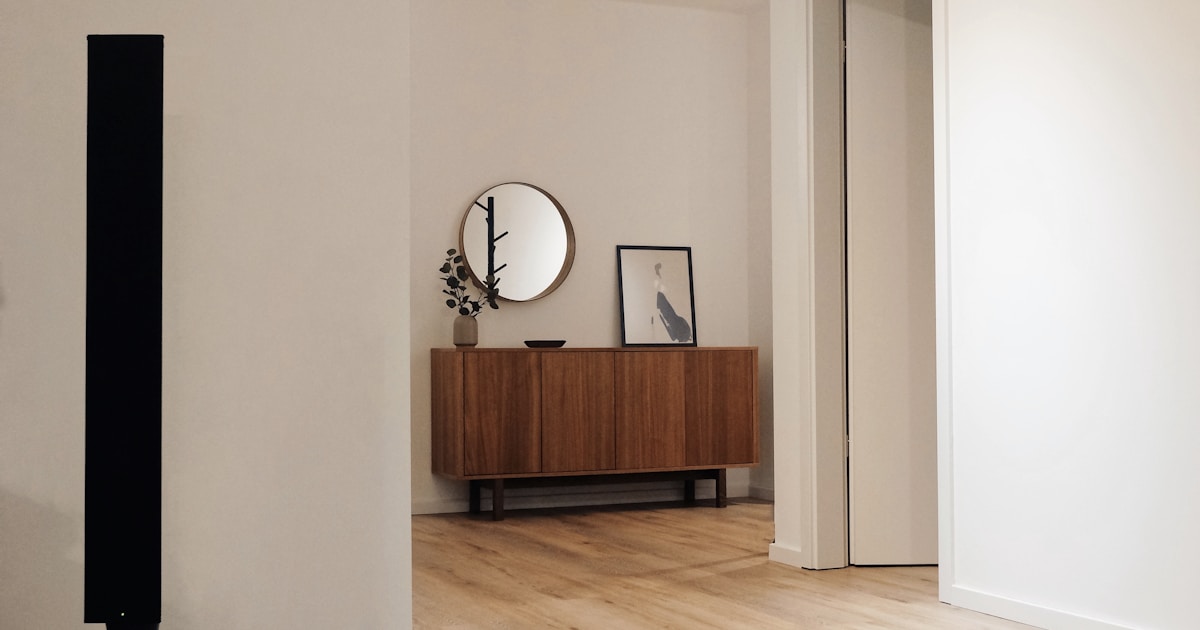 Tile installer cutting tiles with a wet saw